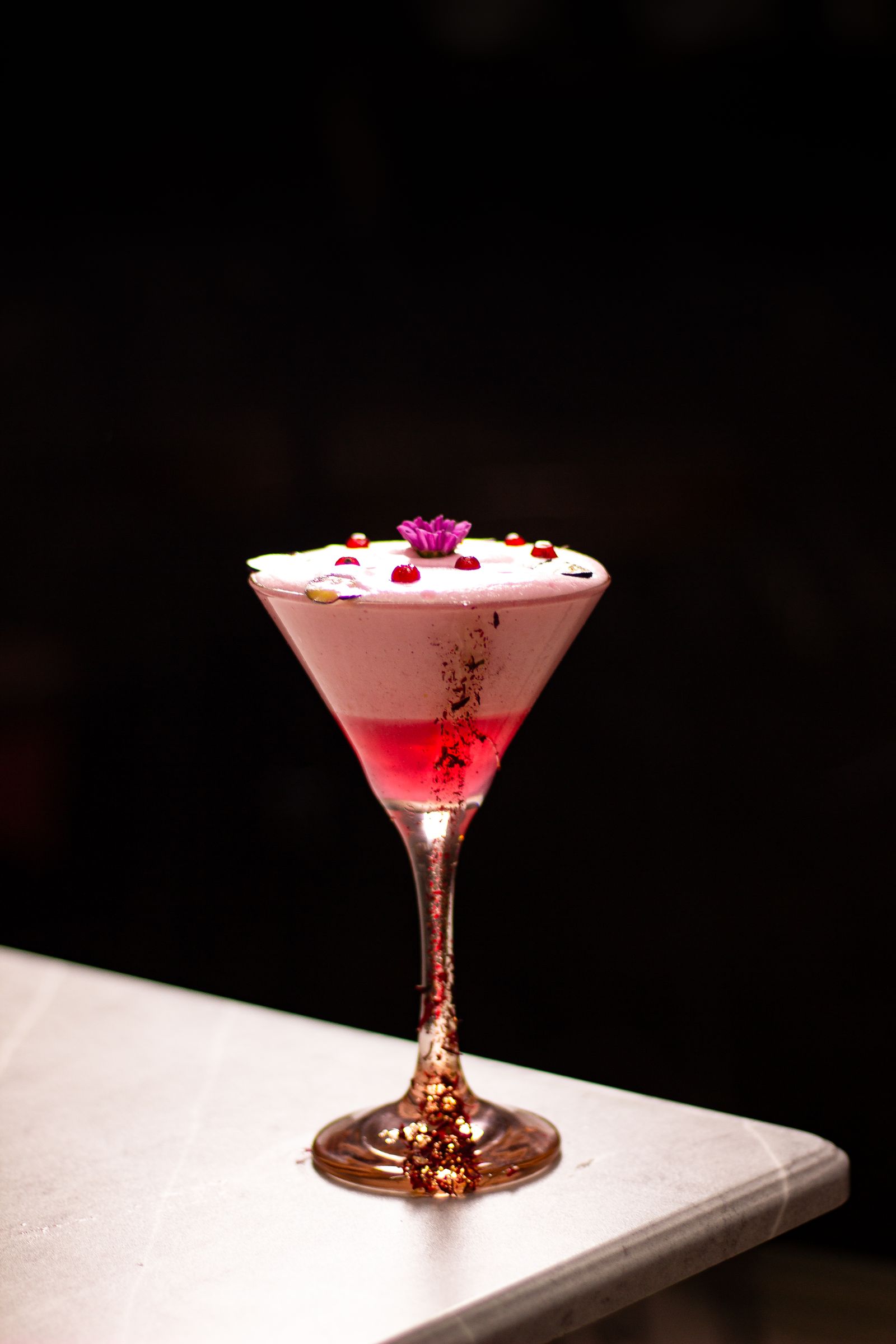 Layered zero-proof mocktail with garnish